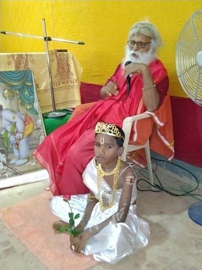 An Adivasi dressed up as king Prahlad during Bhagvad Saptaham