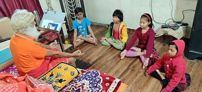 The inhouse kids are given Yoga lessons by Swamiji everyday at 5am